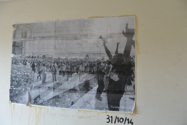 A photo of demonstrators that has since been hung in the second floor bedroom that looks out over the city of Ouagadougou.